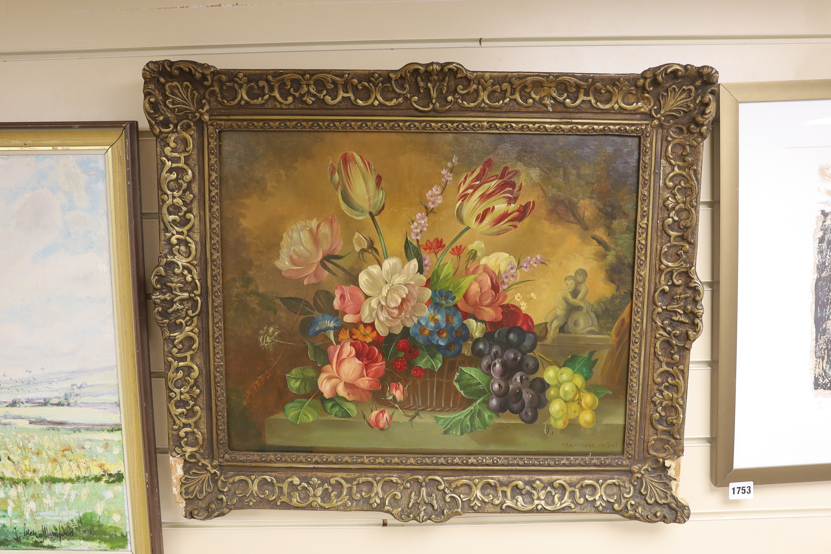 Alexander Wilson (20th C.), oil on board, Still life of flowers in a basket upon a ledge, signed, 39 x 49cm